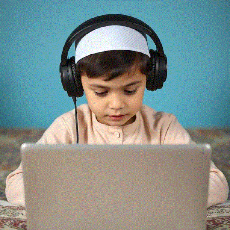 8-year-old kid wearing a white prayer cap and headphones, engaged in an online Quran class on his laptop, focused on learning.